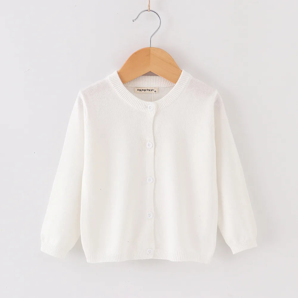 Cardigan bébé en maille de coton — 9 coloris unis
