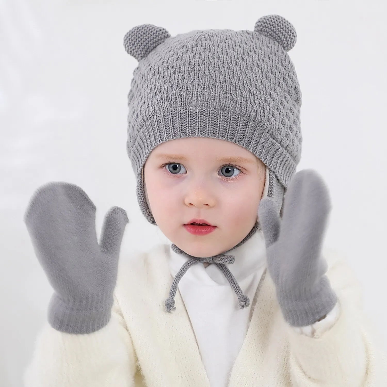 Bonnet et moufles bébé en maille — doublés polaire