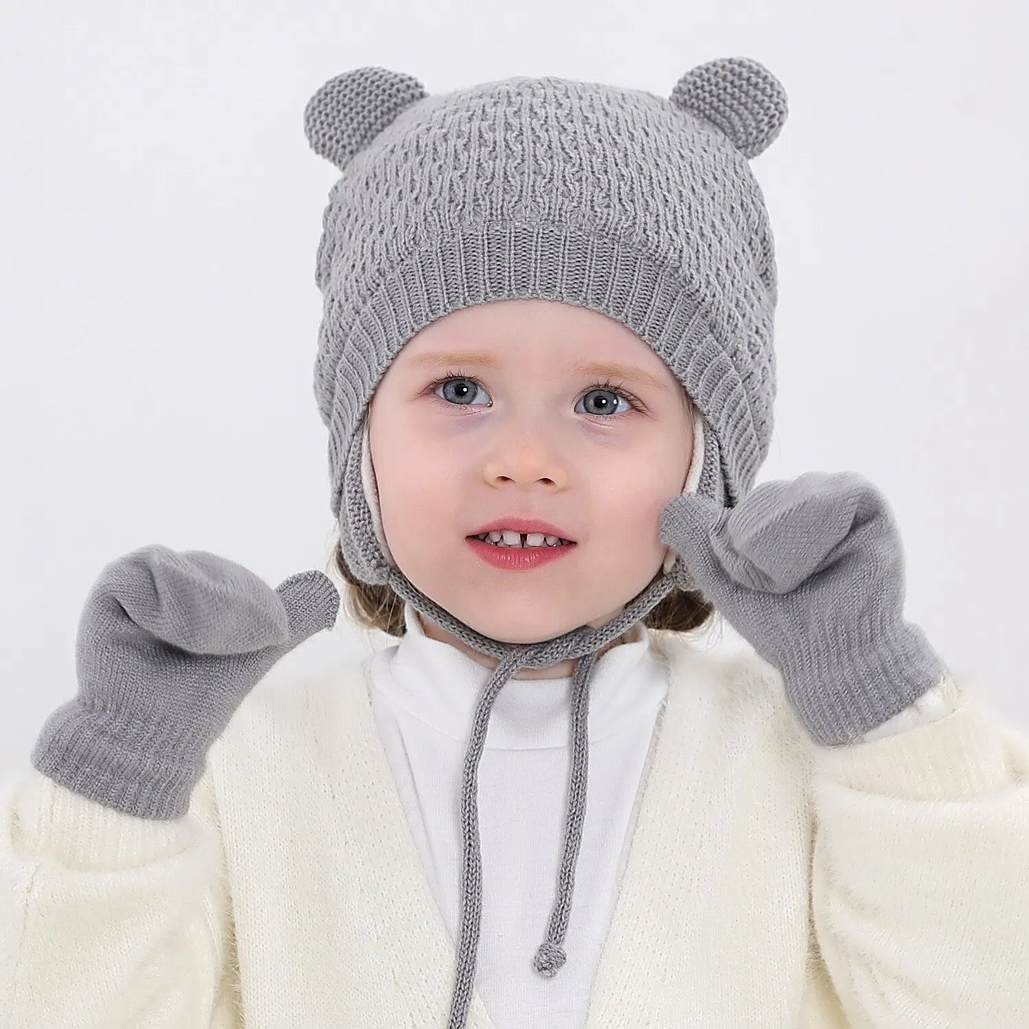 Bonnet et moufles bébé en maille — doublés polaire